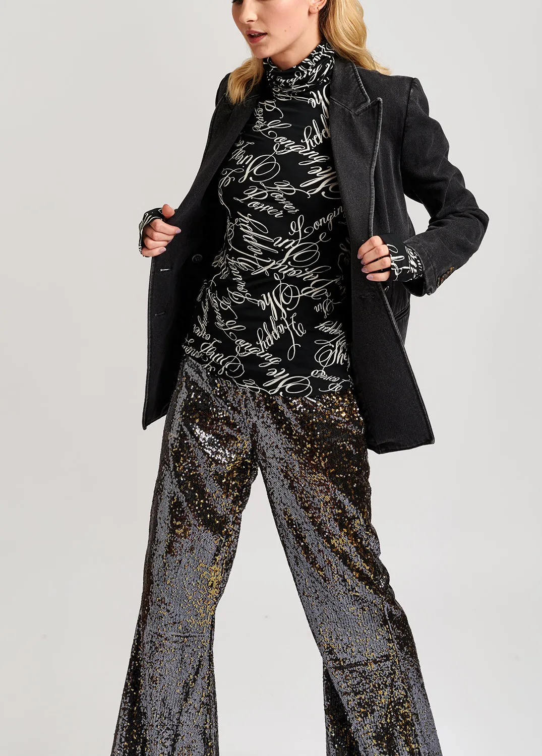 Black and gold sequined flared pants