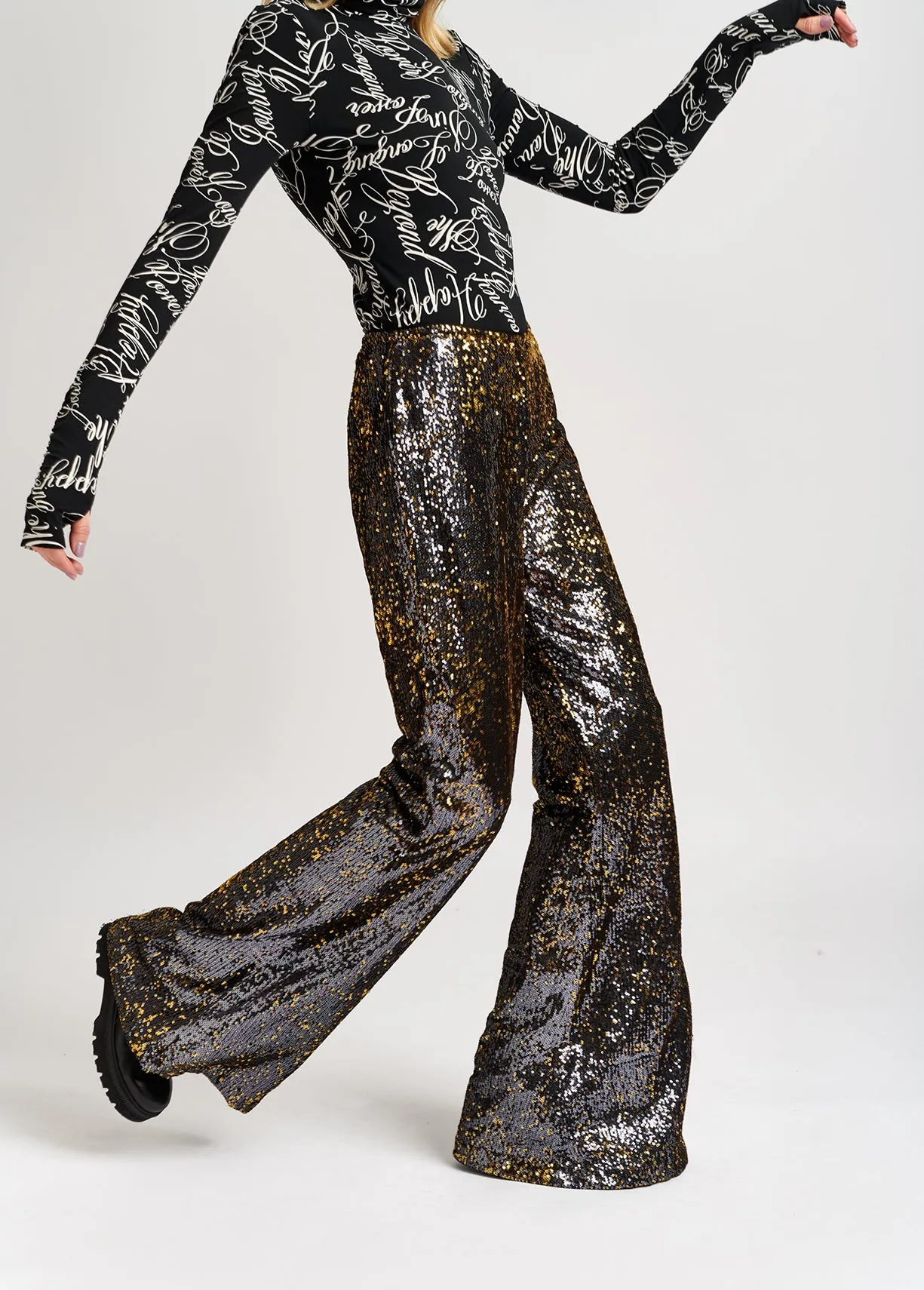 Black and gold sequined flared pants