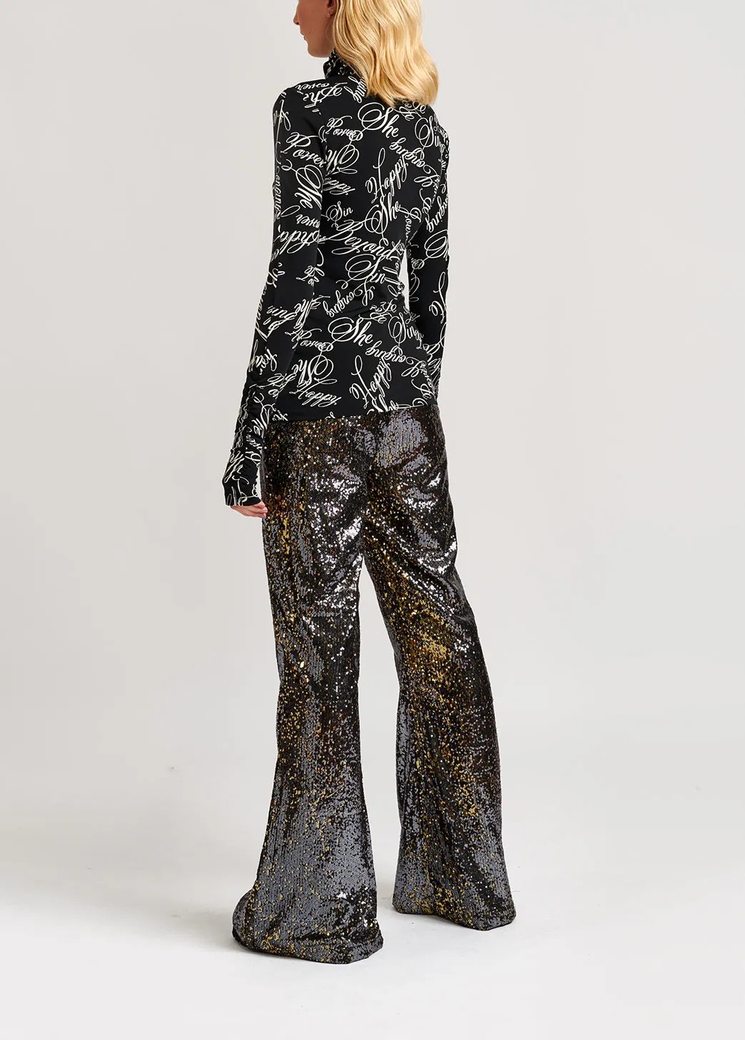 Black and gold sequined flared pants