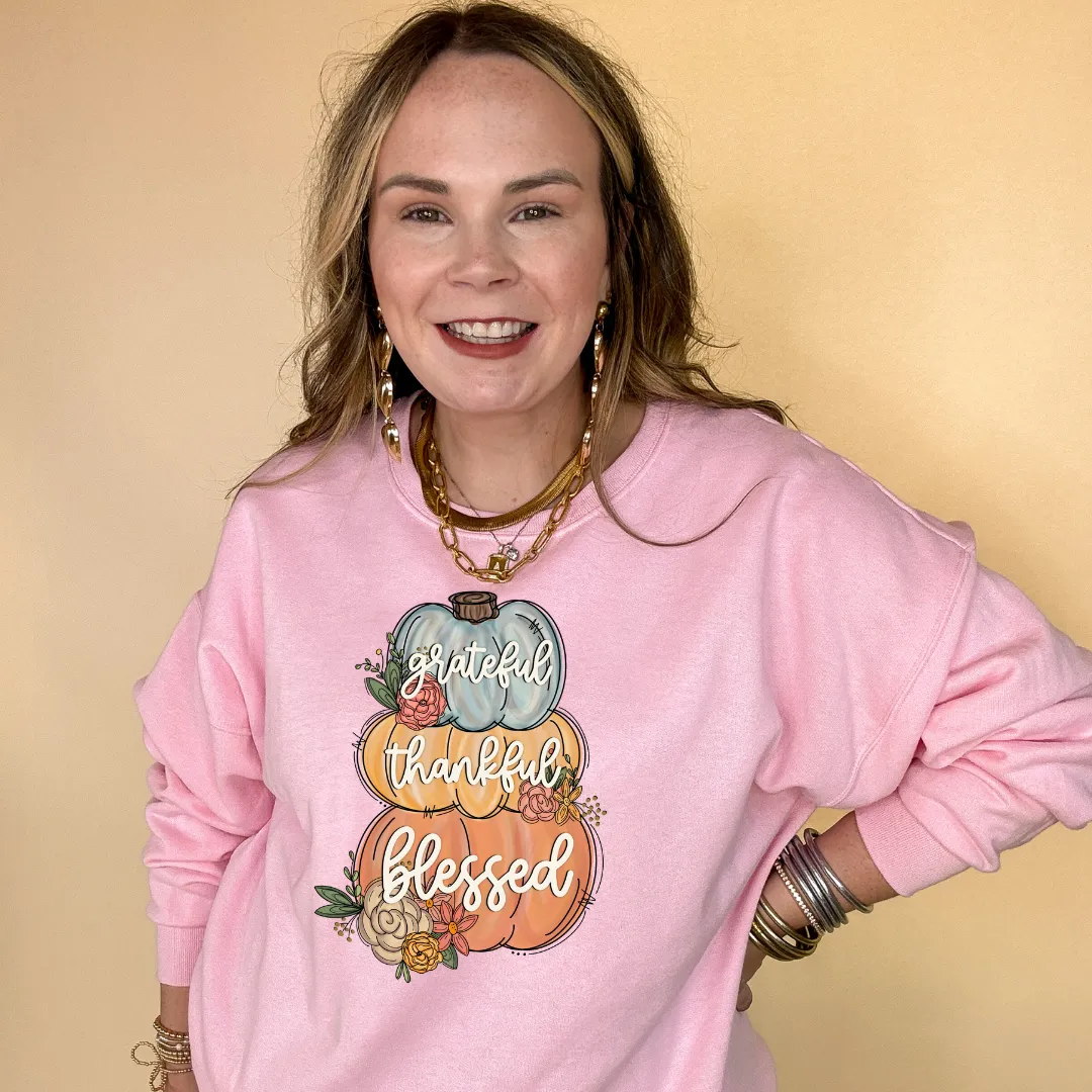 Online Exclusive | Grateful, Thankful, Blessed Stacked Pumpkins and Floral Arrangement Graphic Sweatshirt in Multiple Color Options